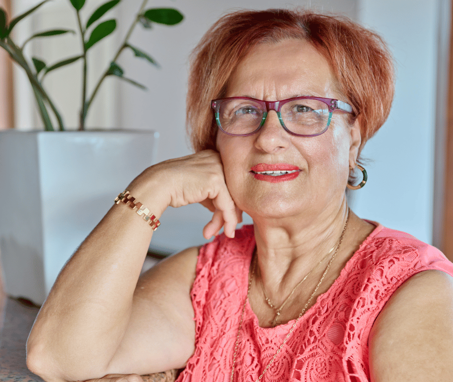 A member at home after finishing her care plan