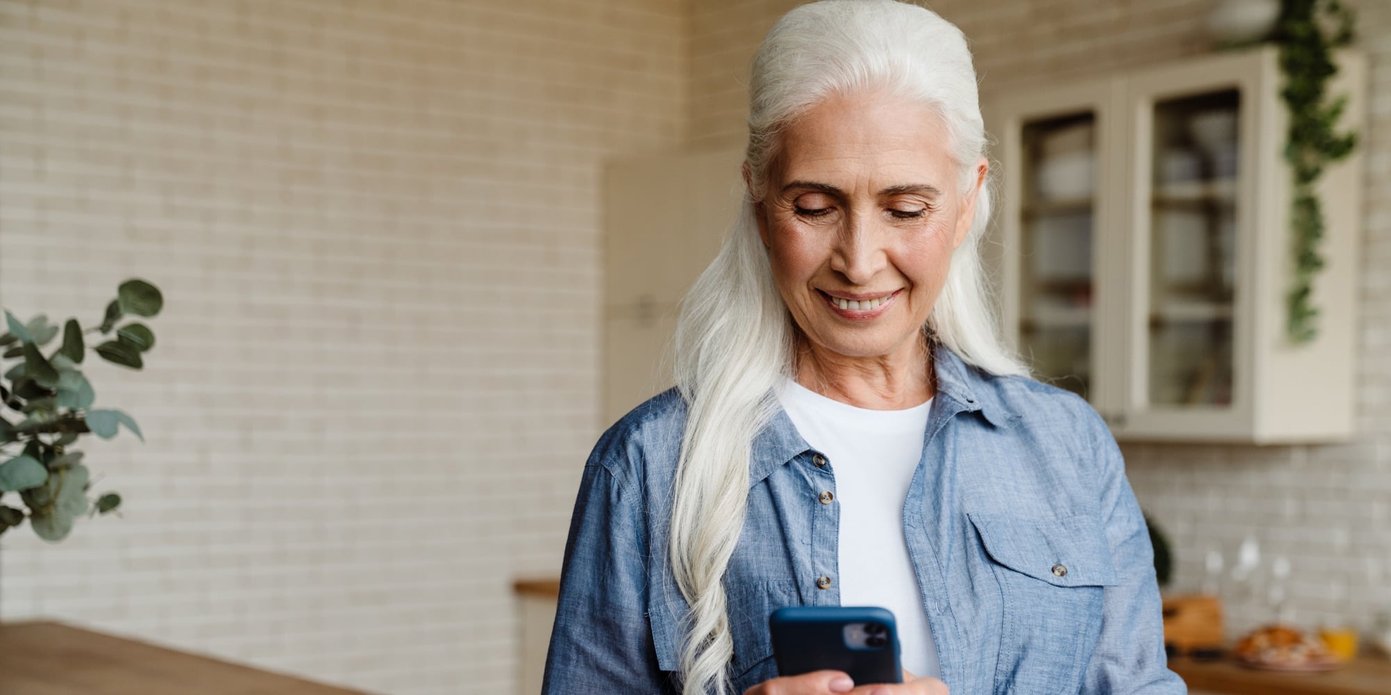 A member checking her RightMove care plan at home